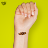 Tatouage éphémère Halloween coloré motif bonbon rayé sucre et sortilèges