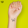 Tatouage éphémère motif papillon minimaliste